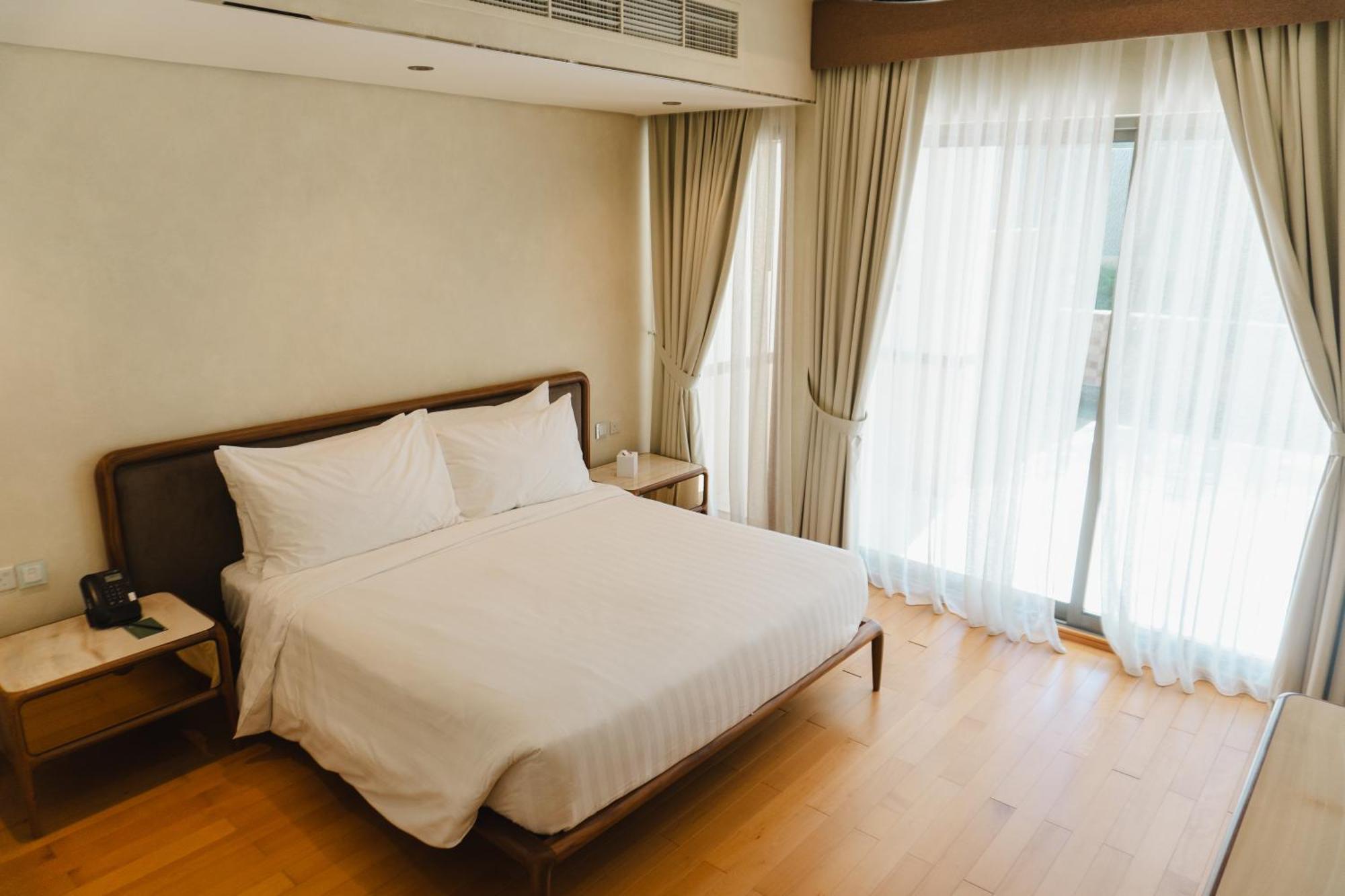 Palavra Resort Manama Eksteriør bilde A bedroom at the hotel