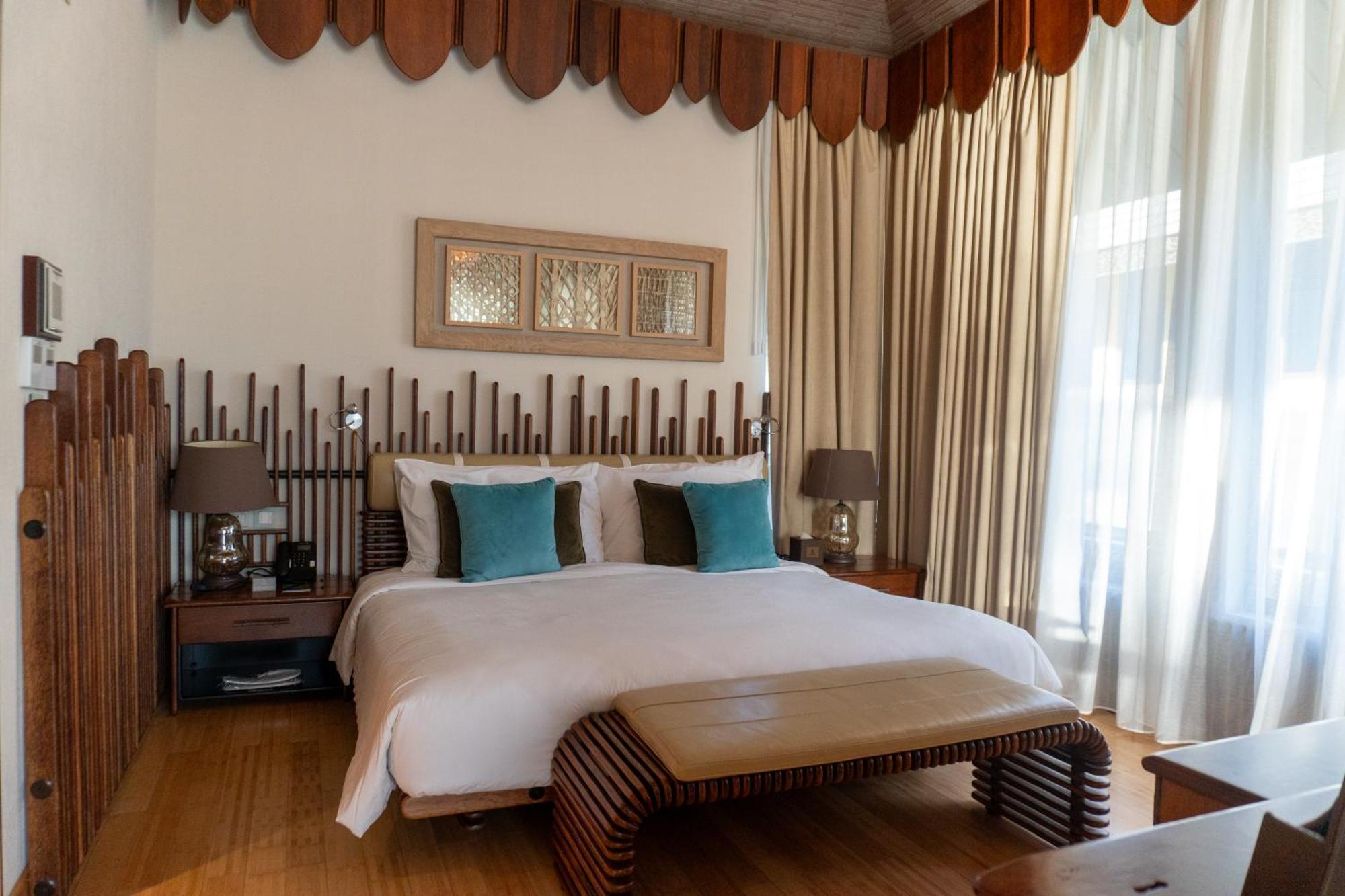 Palavra Resort Manama Eksteriør bilde A bedroom at the hotel