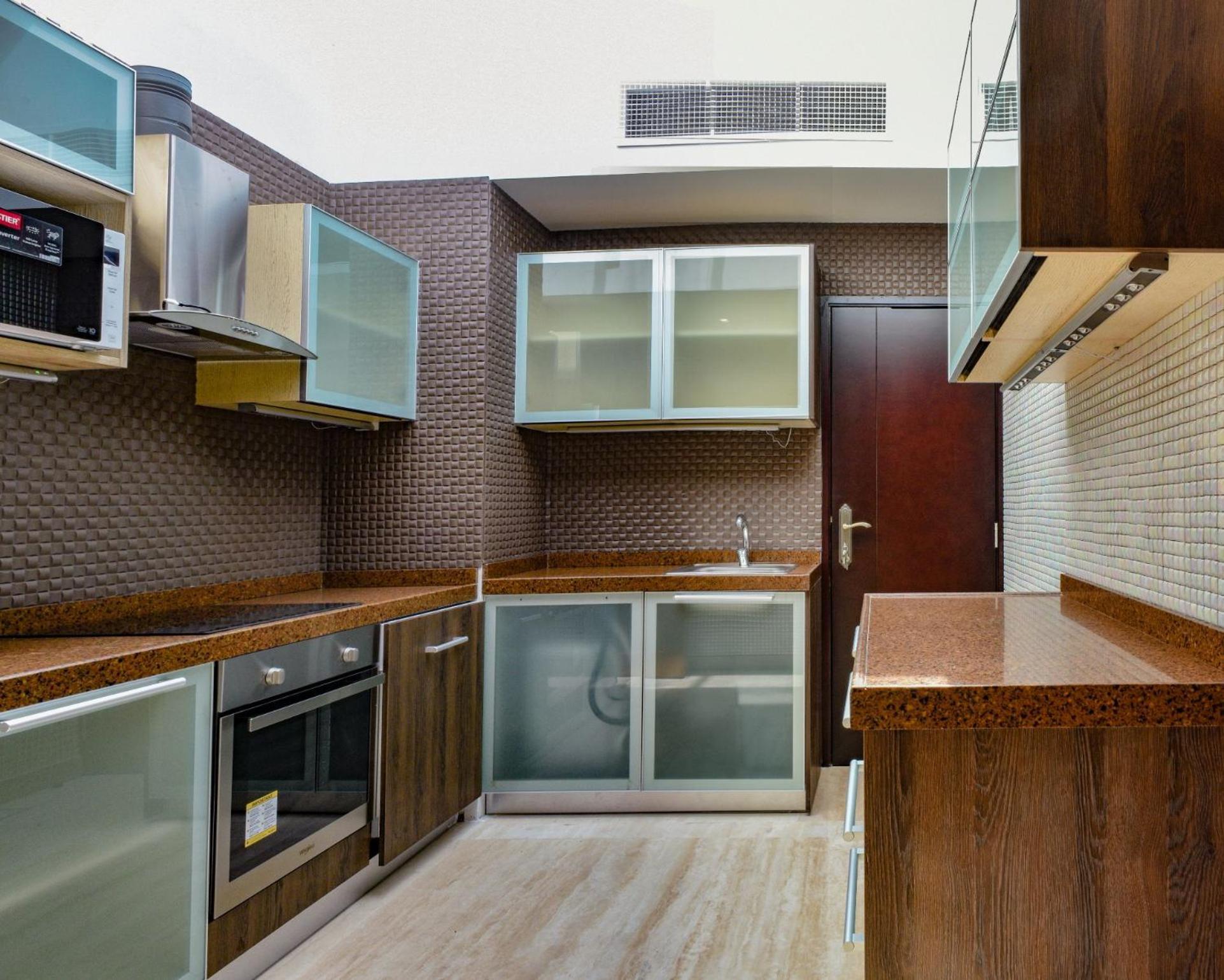 Palavra Resort Manama Eksteriør bilde A modern kitchen